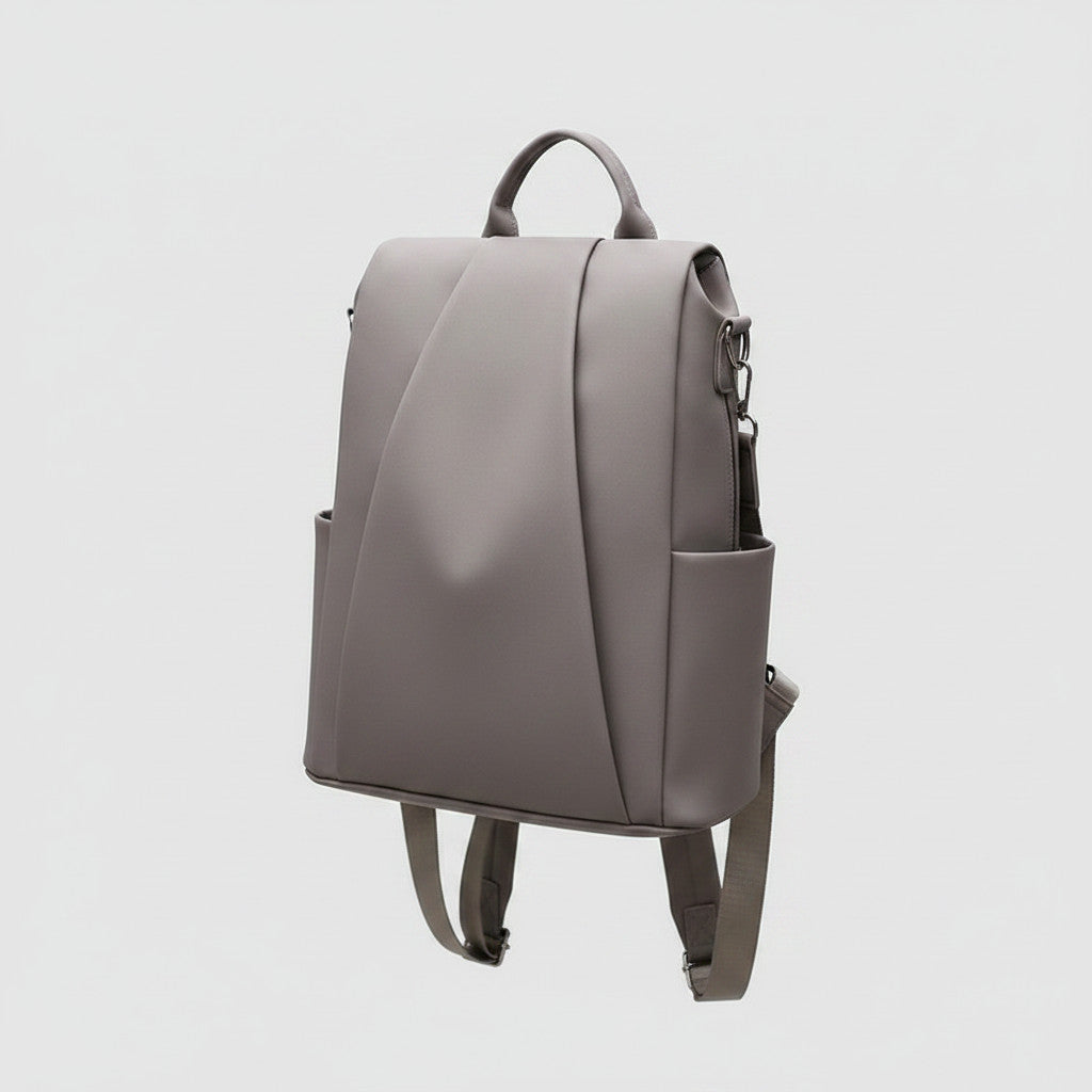 Sac à dos MoveLite gris au design minimaliste et épuré avec des bretelles ajustables