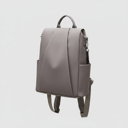 Sac à dos MoveLite gris au design minimaliste et épuré avec des bretelles ajustables