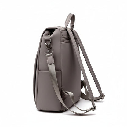 Sac à dos MoveLite gris en cuir synthétique avec bretelles ajustables, vue de profil sur fond blanc