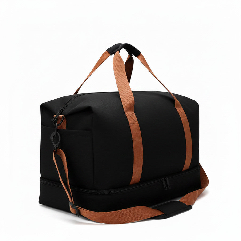 Sac de voyage MoveLite WANDERELLE noir avec anses et bandoulière marron, compartiment inférieur zippé