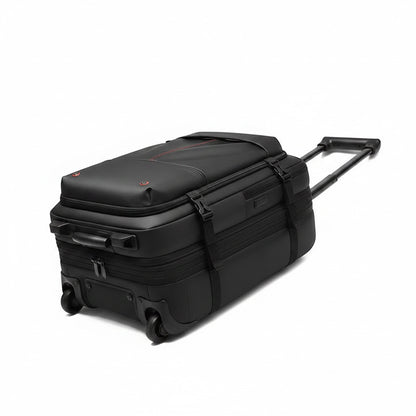Valise cabine noire MoveLite avec poignée télescopique, design 2-en-1 sac à dos et trolley pour voyage professionnel.