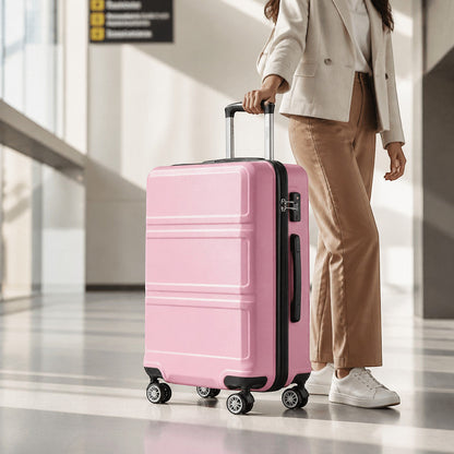 Valise cabine rose MoveLite rigide à quatre roues dans un aéroport, tenue par une femme en tenue élégante